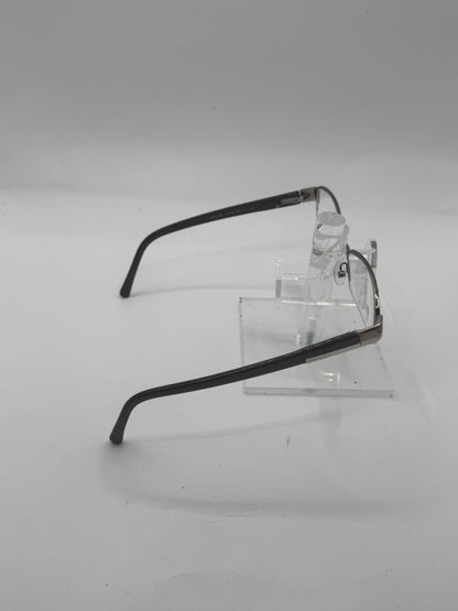 Prada Vpr64h Eyeglasses in color 7bp1o1