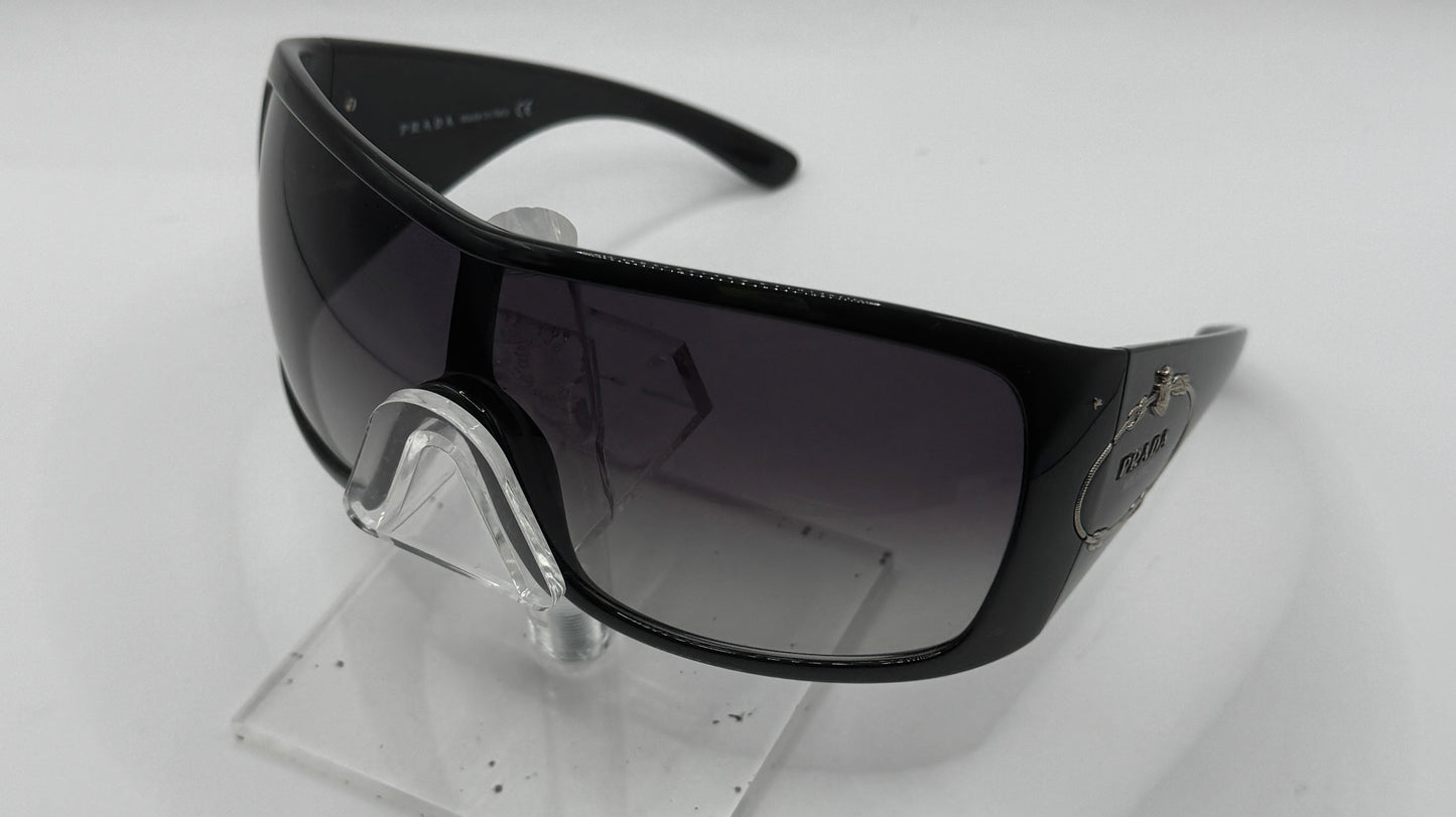 Prada Spr04h Sunglasses in color 1ab5d1