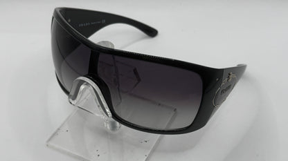 Prada Spr04h Sunglasses in color 1ab5d1