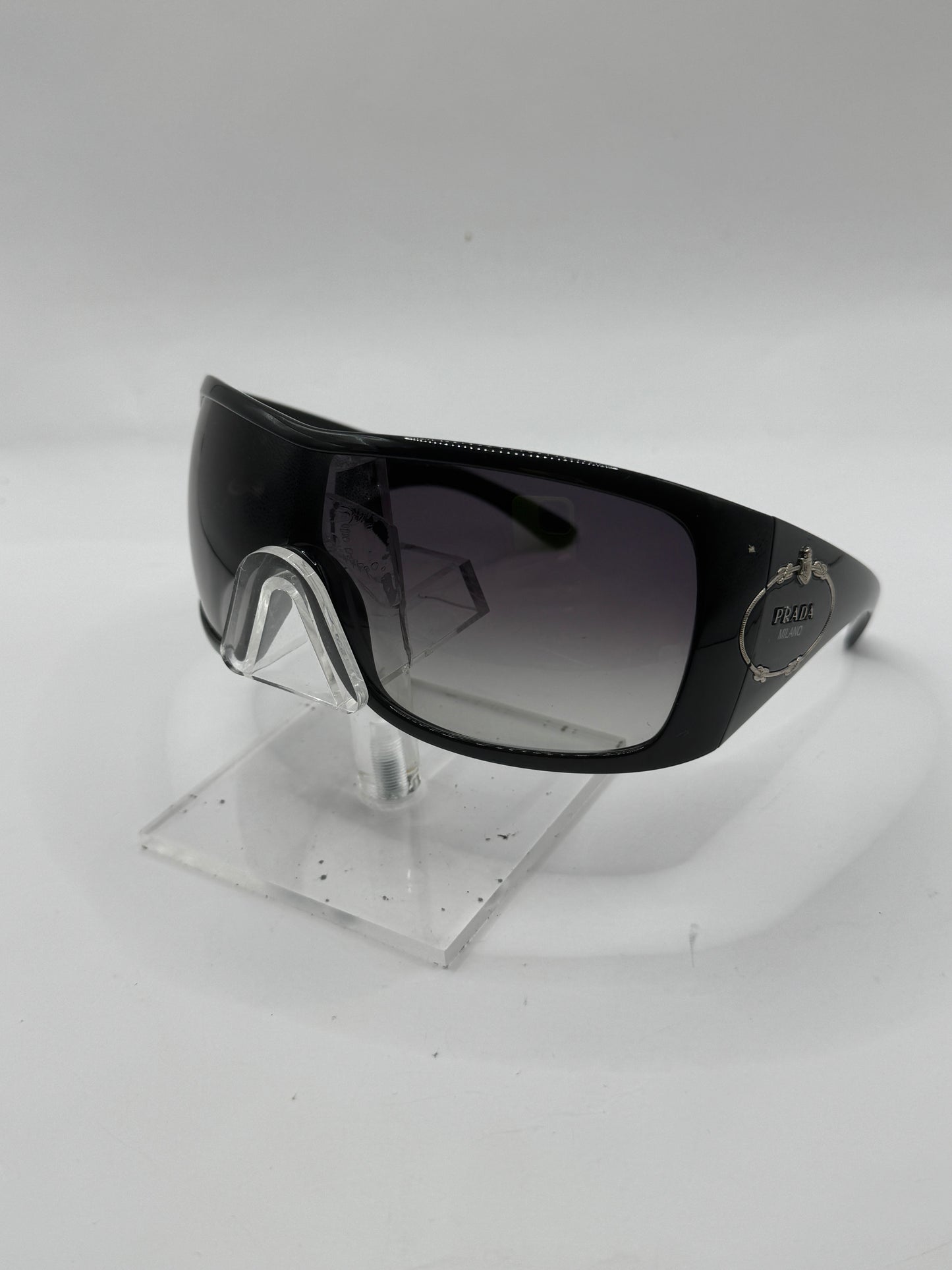 Prada Spr04h Sunglasses in color 1ab5d1