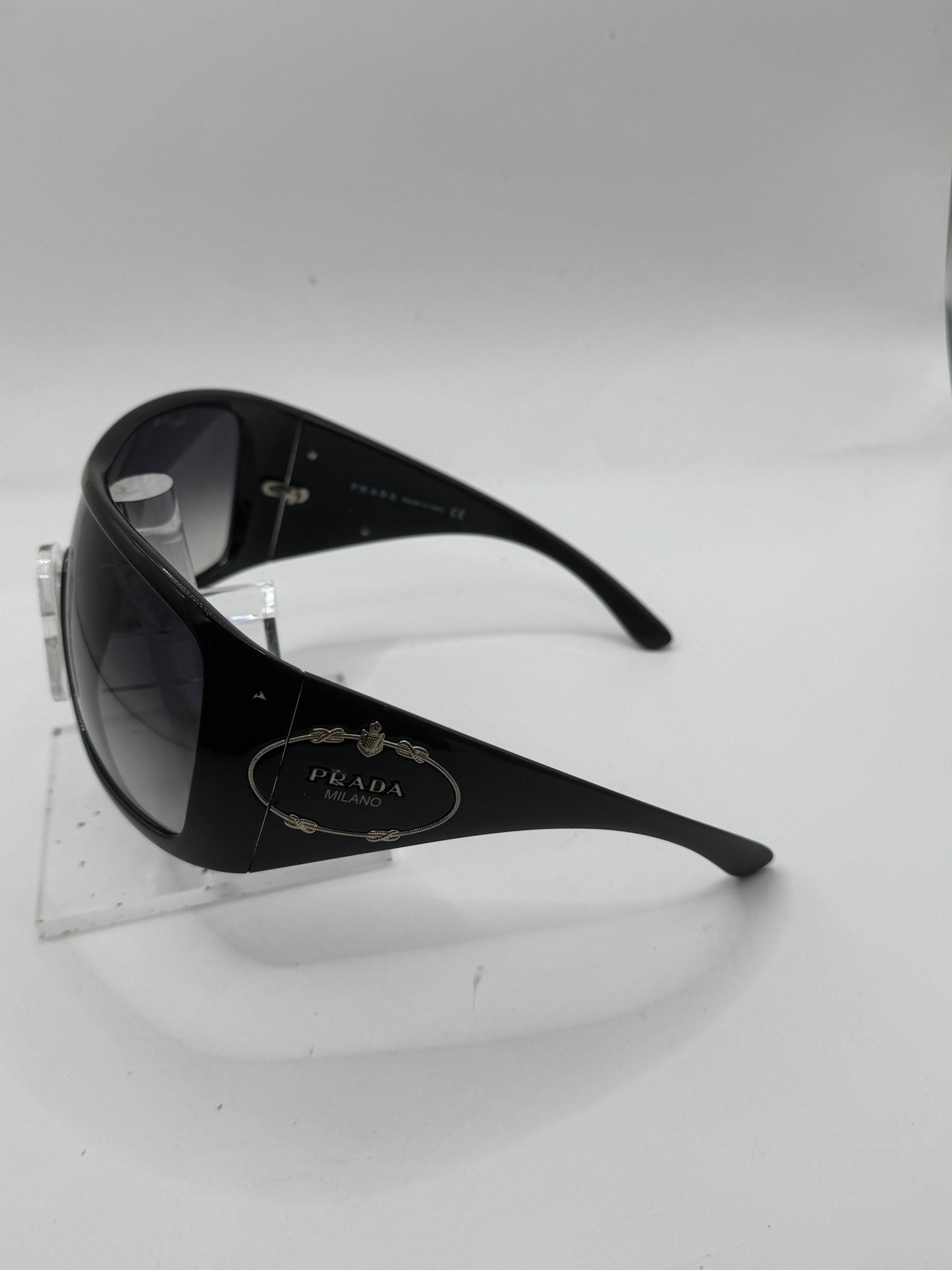 Prada Spr04h Sunglasses in color 1ab5d1