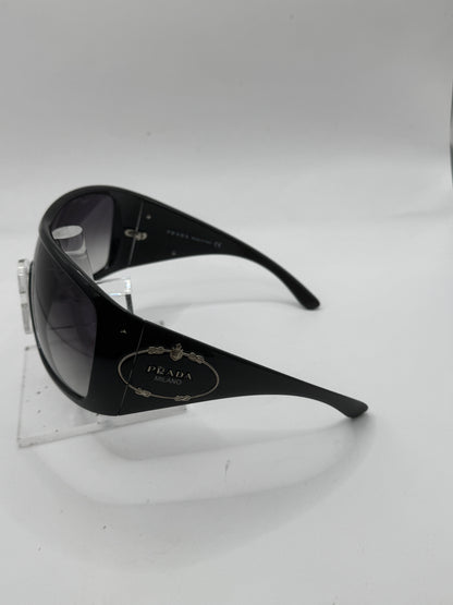 Prada Spr04h Sunglasses in color 1ab5d1