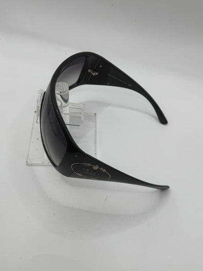 Prada Spr04h Sunglasses in color 1ab5d1