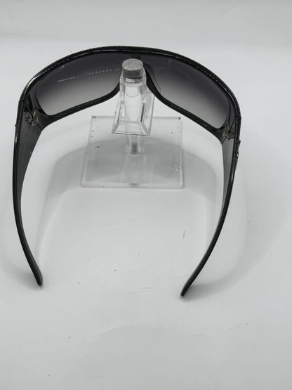 Prada Spr04h Sunglasses in color 1ab5d1