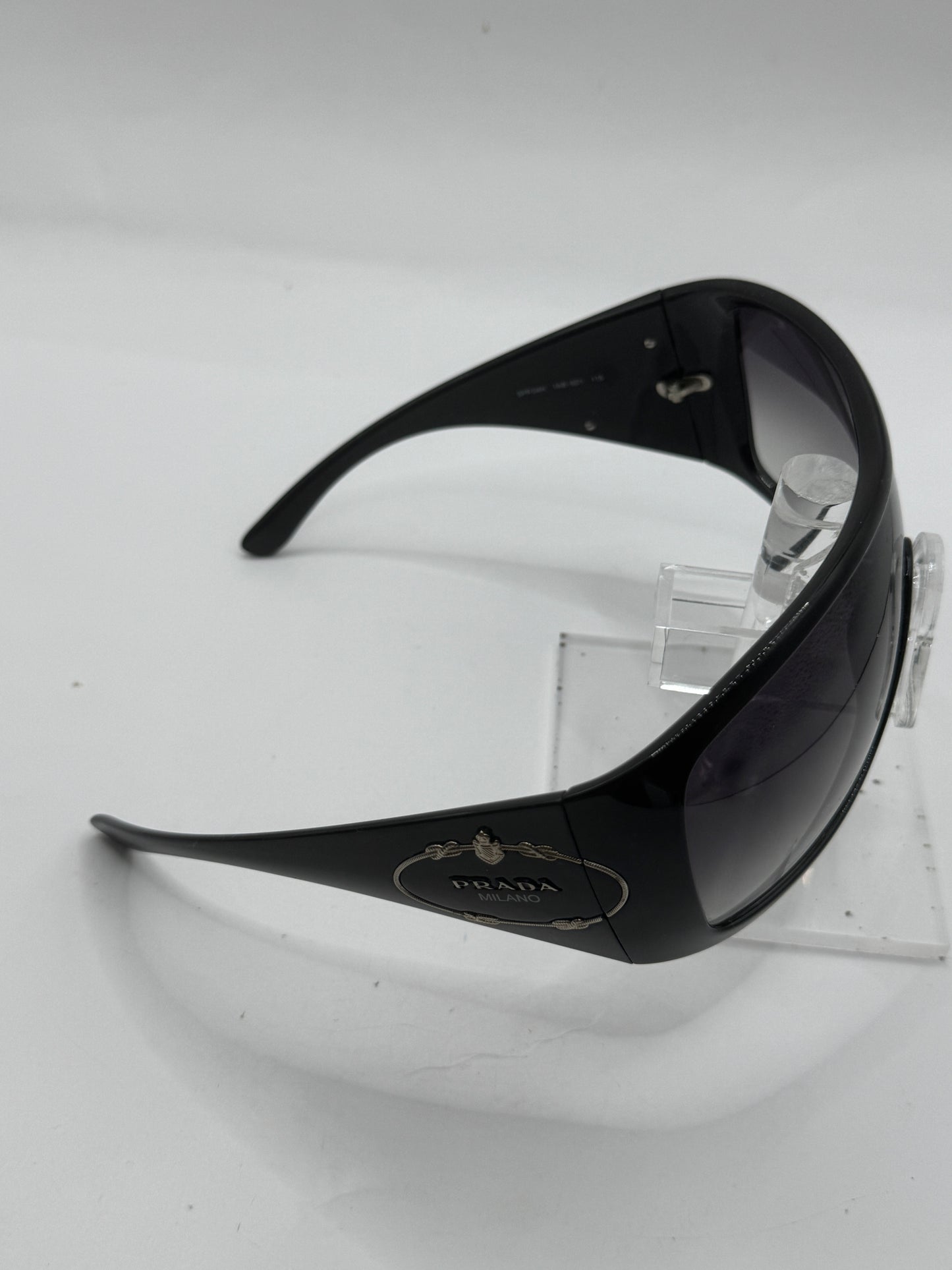 Prada Spr04h Sunglasses in color 1ab5d1