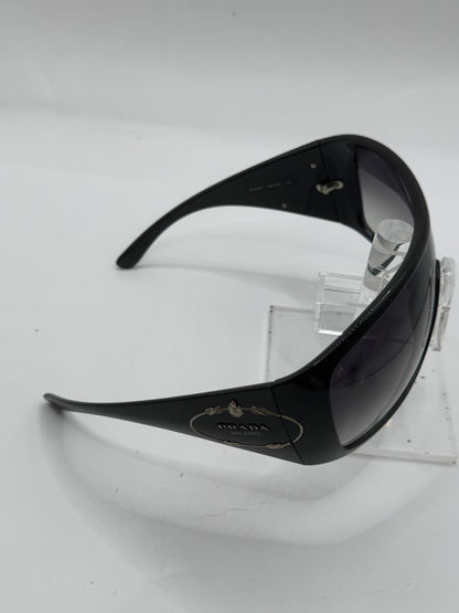Prada Spr04h Sunglasses in color 1ab5d1