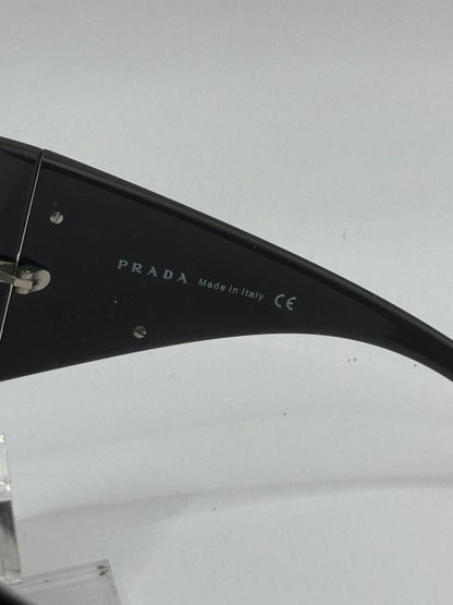Prada Spr04h Sunglasses in color 1ab5d1