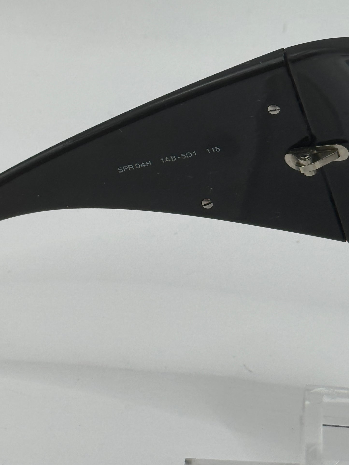 Prada Spr04h Sunglasses in color 1ab5d1