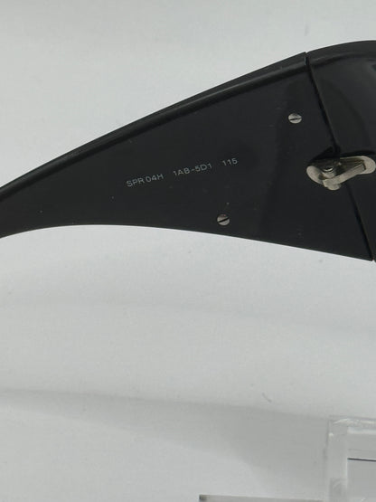Prada Spr04h Sunglasses in color 1ab5d1