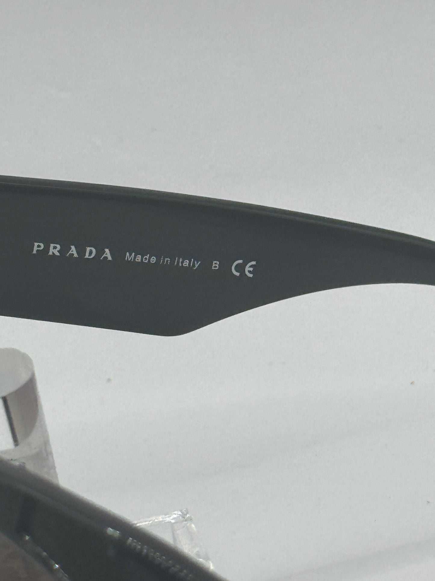 Prada Spr22q Sunglasses in color 1ab0a7