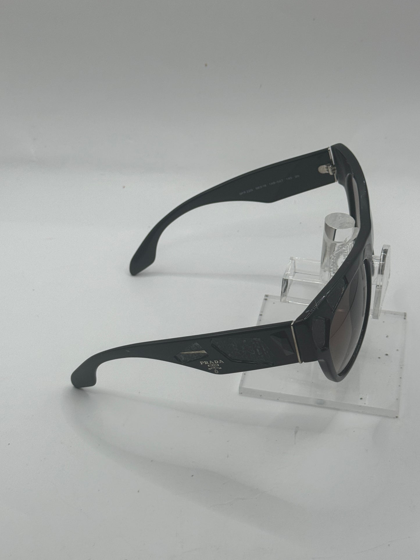Prada Spr22q Sunglasses in color 1ab0a7
