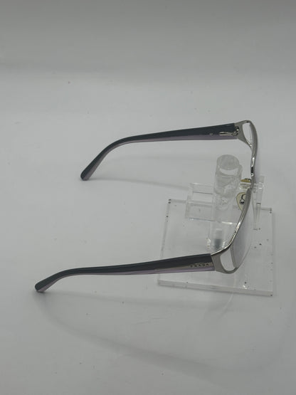 Prada Vpr58i Eyeglasses in color 7031o1