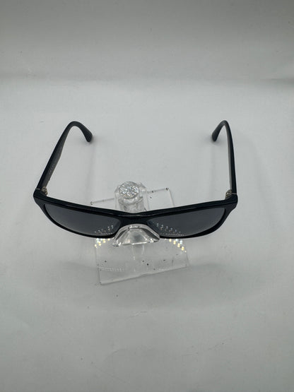 Prada Spr19s Sunglasses in color 1ab0a7