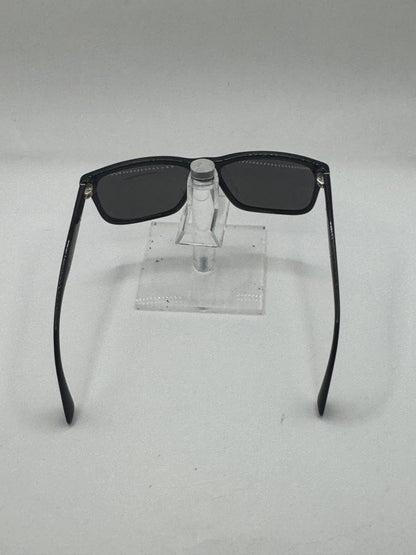 Prada Spr19s Sunglasses in color 1ab0a7