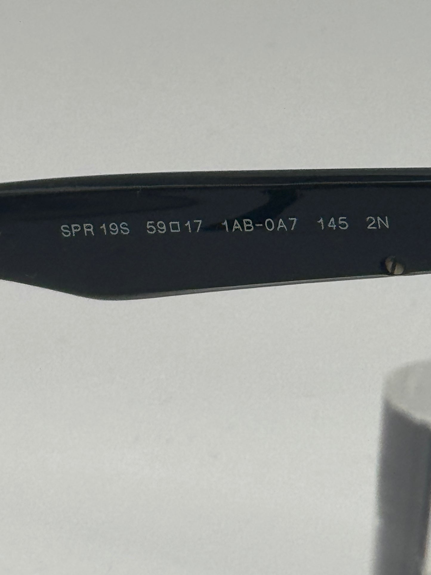 Prada Spr19s Sunglasses in color 1ab0a7