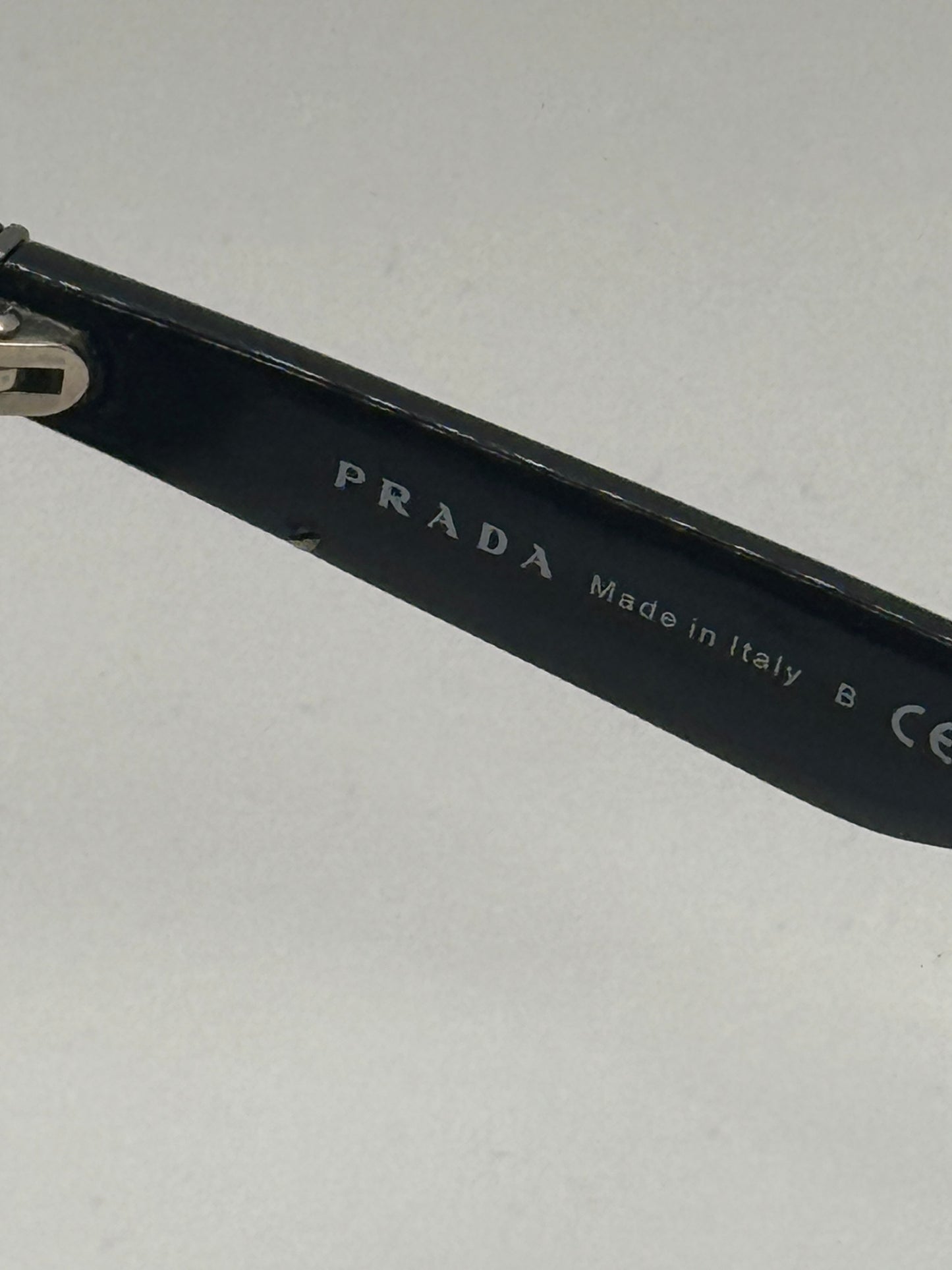 Prada Spr19s Sunglasses in color 1ab0a7