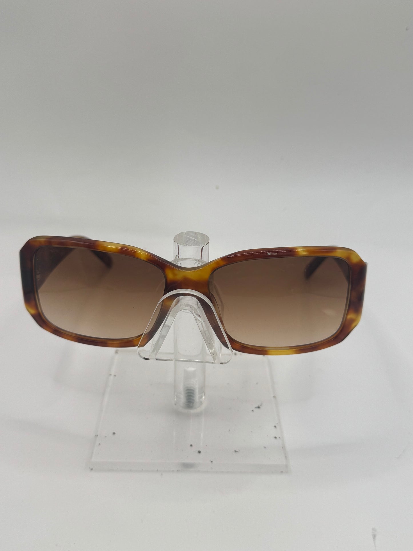 Prada Spr14h Sunglasses in color 4bw6s1