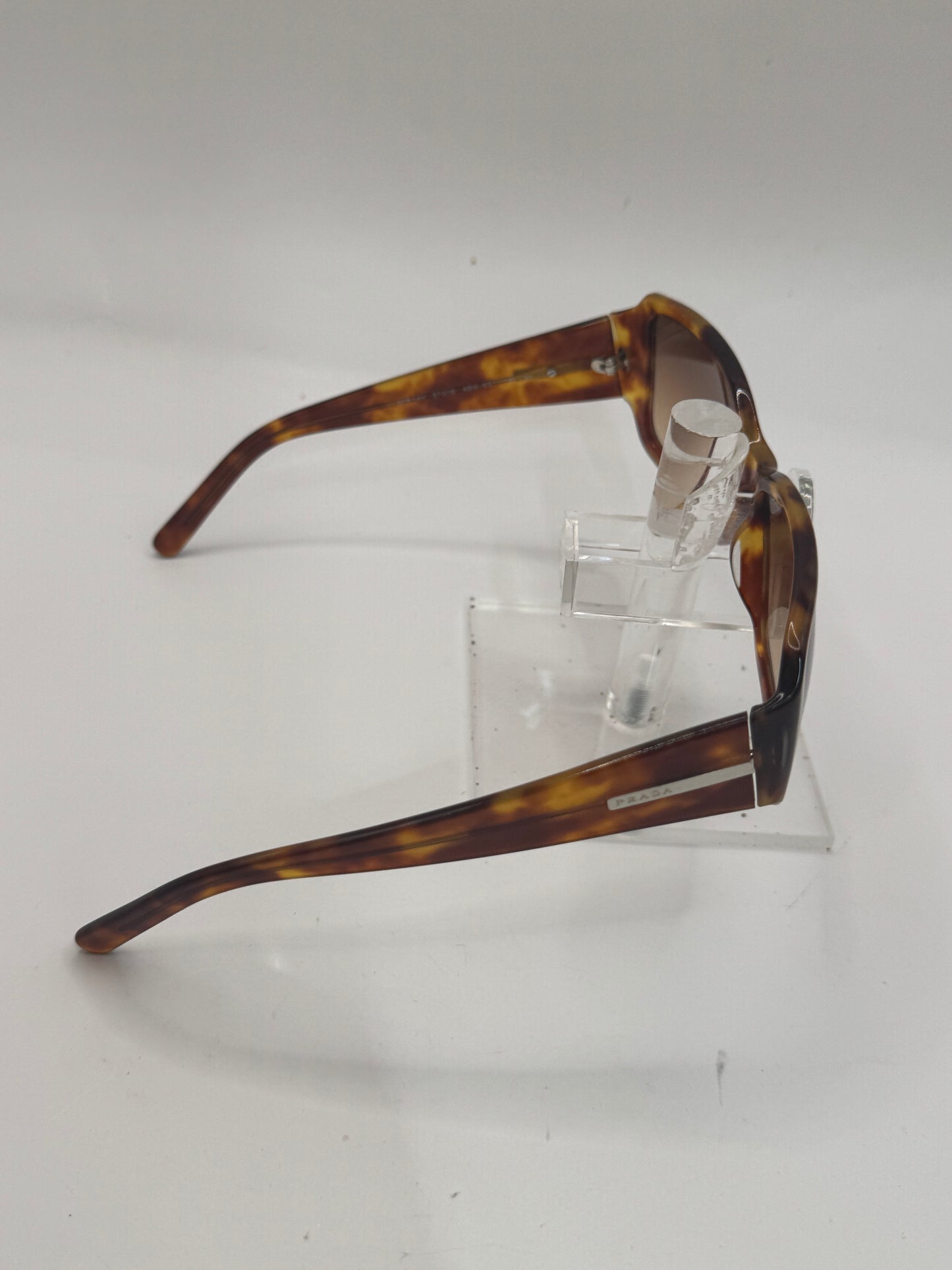 Prada Spr14h Sunglasses in color 4bw6s1