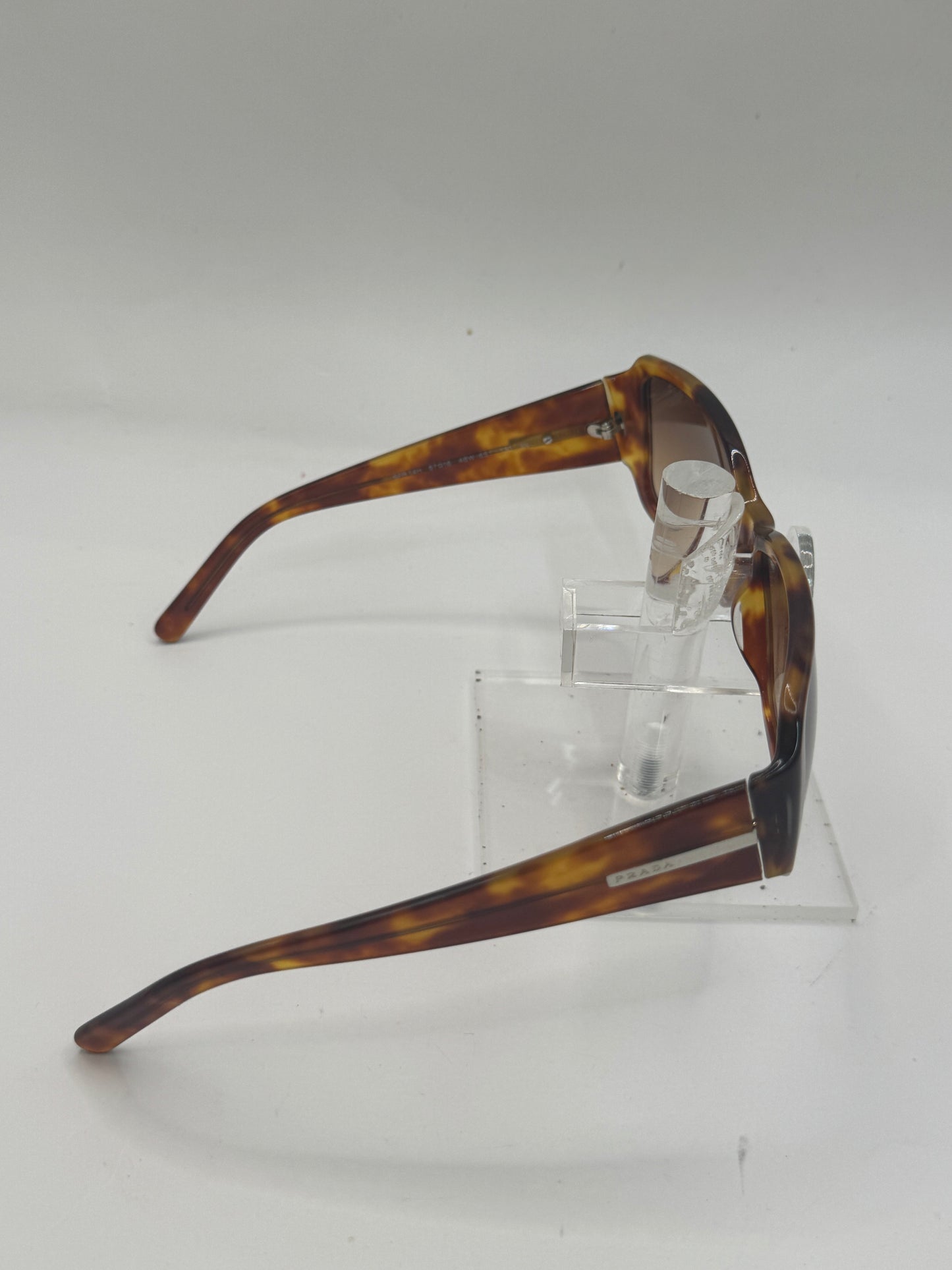 Prada Spr14h Sunglasses in color 4bw6s1