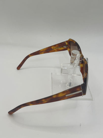Prada Spr14h Sunglasses in color 4bw6s1