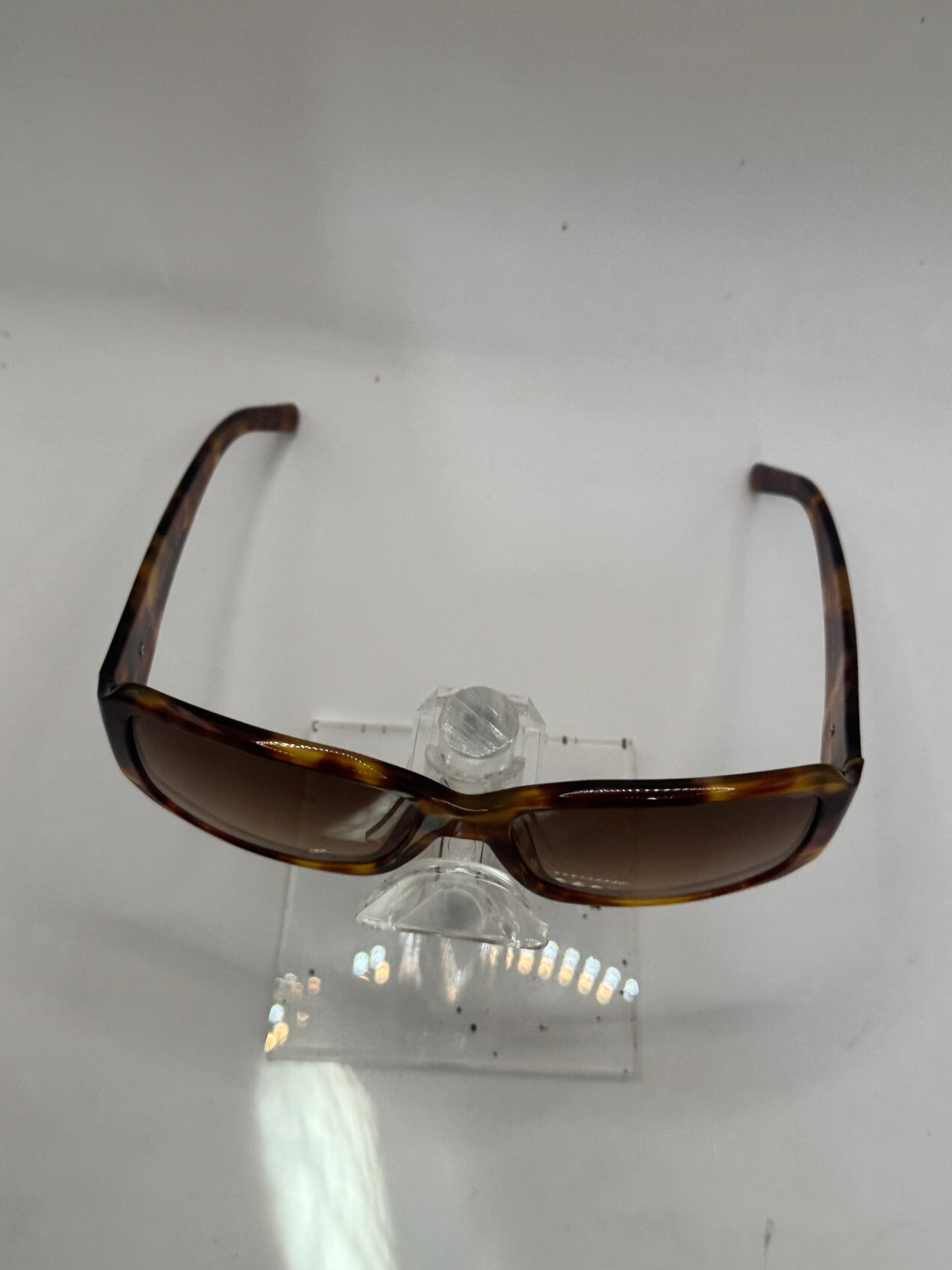 Prada Spr14h Sunglasses in color 4bw6s1