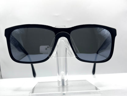 Prada Spr19s Sunglasses in color 1ab0a7