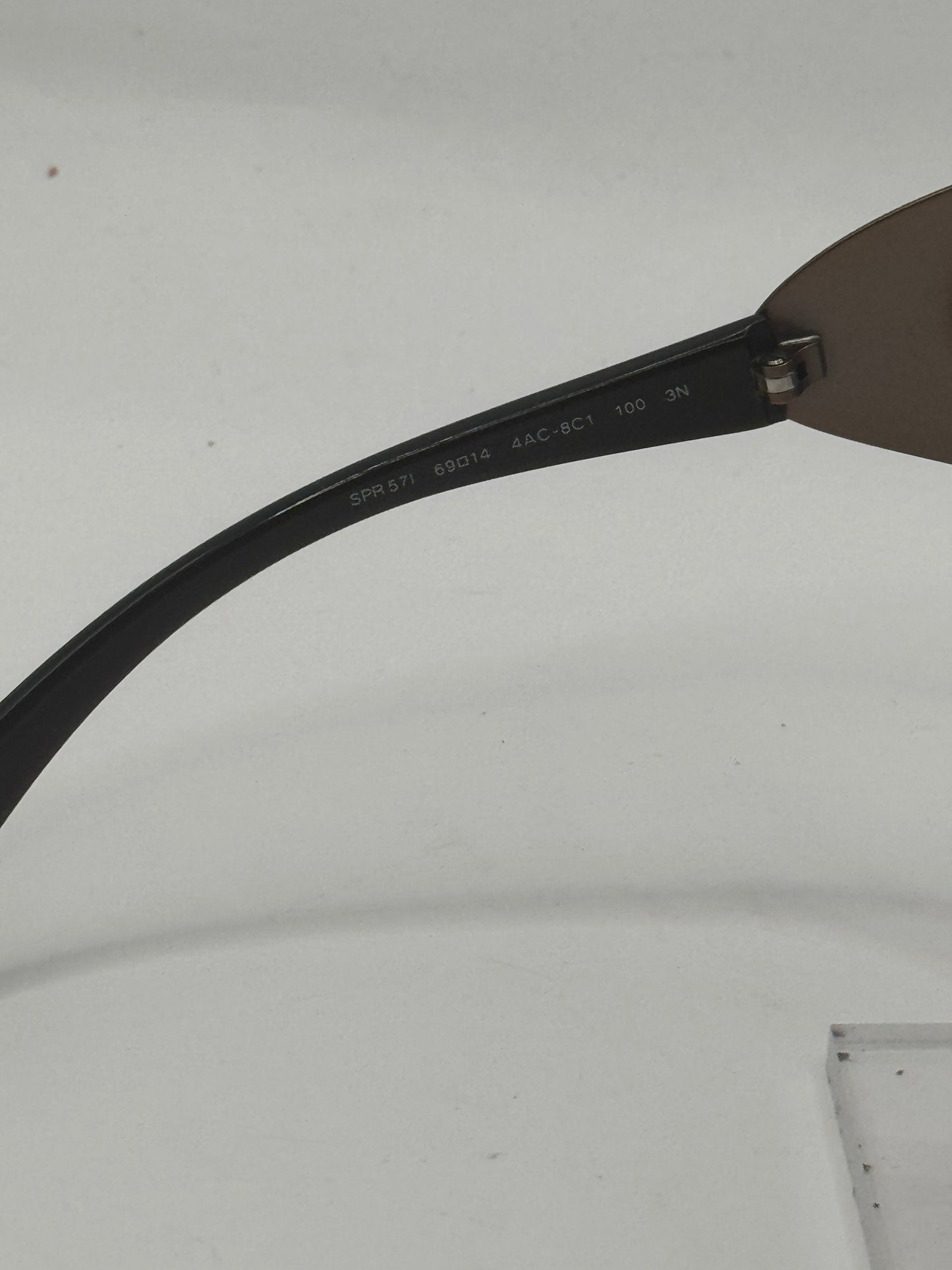 Prada Spr57i Sunglasses in color 4ac8c1