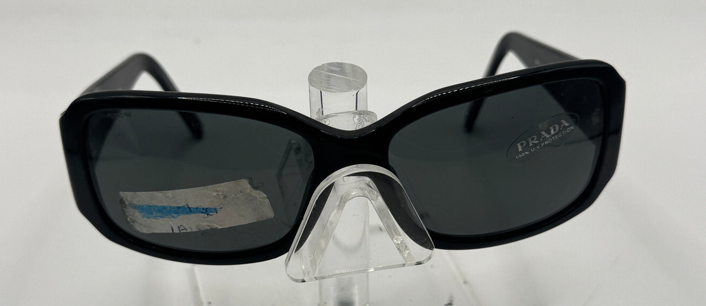 Prada Spr14h Sunglasses in color 1ab1a1