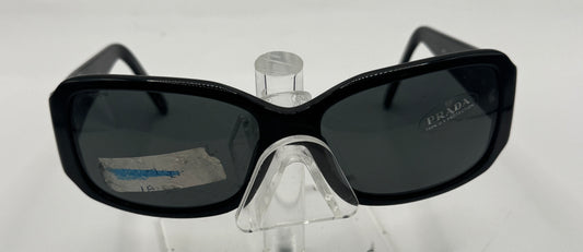 Prada Spr14h Sunglasses in color 1ab1a1