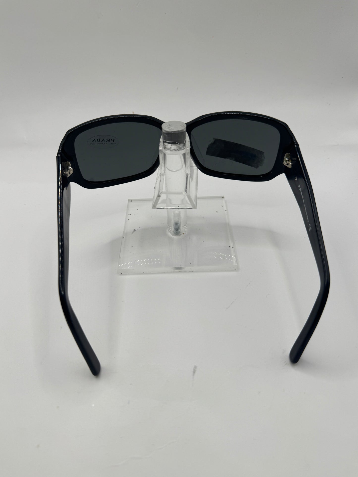 Prada Spr14h Sunglasses in color 1ab1a1