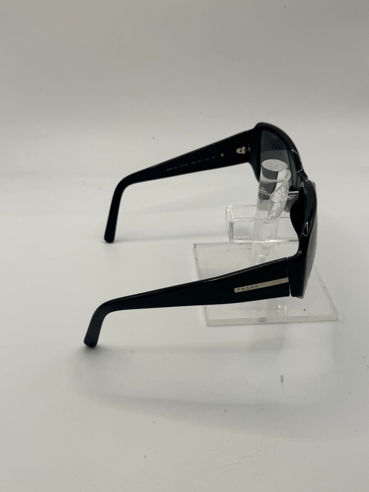 Prada Spr14h Sunglasses in color 1ab1a1