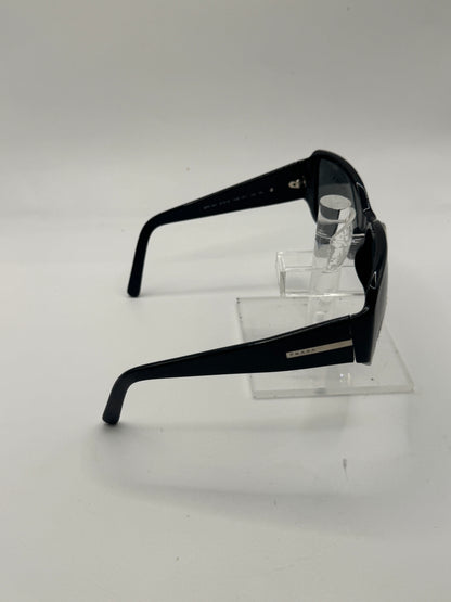 Prada Spr14h Sunglasses in color 1ab1a1