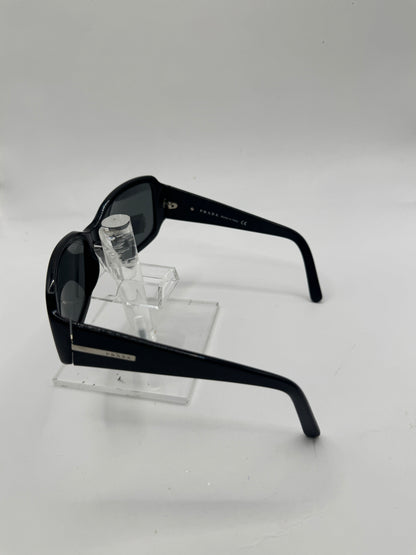 Prada Spr14h Sunglasses in color 1ab1a1