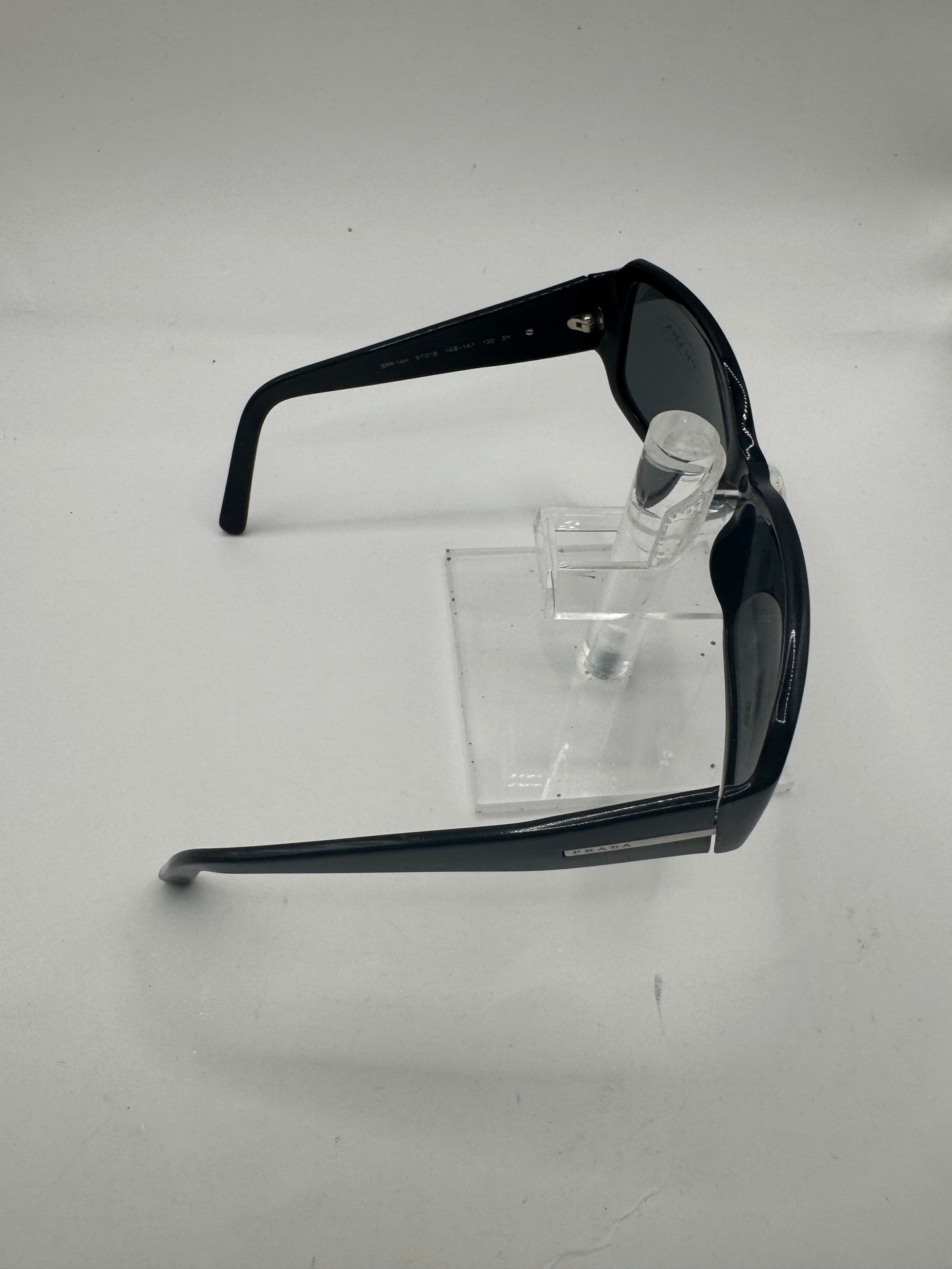 Prada Spr14h Sunglasses in color 1ab1a1