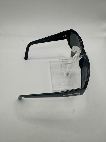 Prada Spr14h Sunglasses in color 1ab1a1