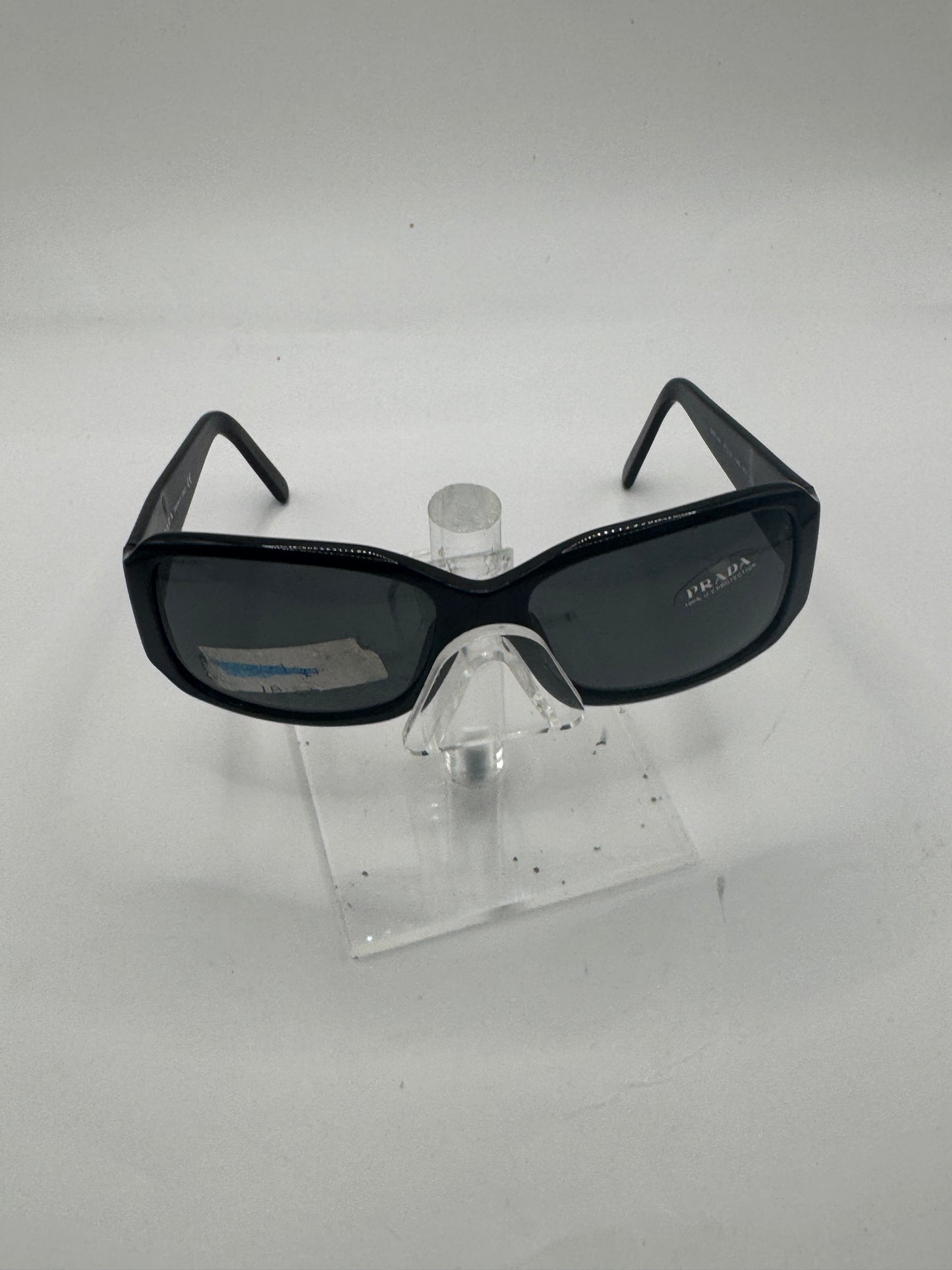Prada Spr14h Sunglasses in color 1ab1a1