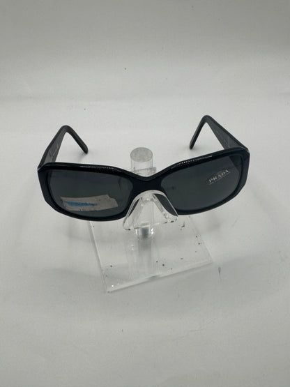 Prada Spr14h Sunglasses in color 1ab1a1